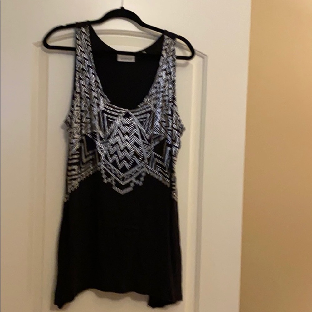 Black sleeveless blouse with metal detail